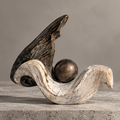 Abstract wave and orb decorative sculpture without text overlay